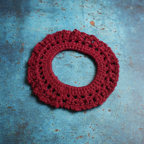 Burgundy sparkle summer scrunchie on patina blue background