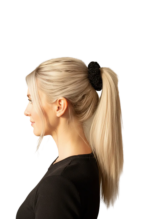 Blonde woman with ponytail wearing black sparkle scrunchie