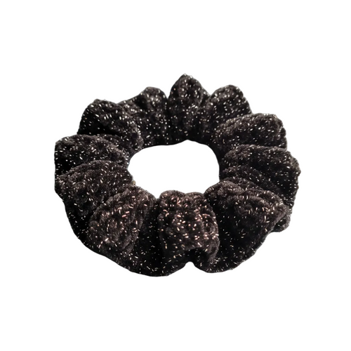 Black sparkle scrunchie on patina blue background